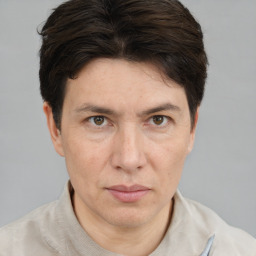 Neutral white adult male with short  brown hair and brown eyes