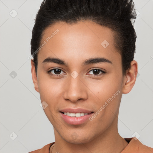 Joyful white young-adult female with short  brown hair and brown eyes