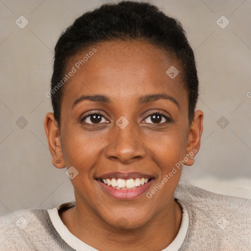 Joyful black young-adult female with short  brown hair and brown eyes