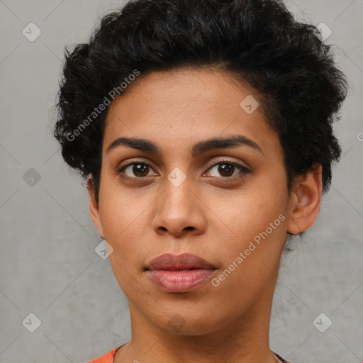 Joyful latino young-adult female with short  black hair and brown eyes