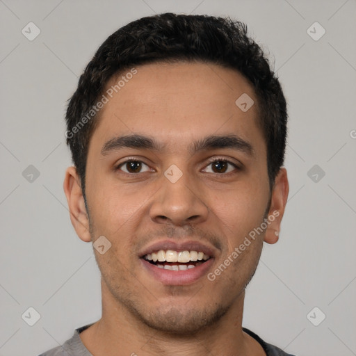 Joyful latino young-adult male with short  black hair and brown eyes