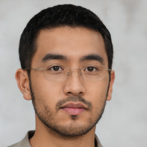Neutral latino young-adult male with short  brown hair and brown eyes