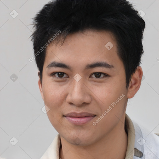 Joyful asian young-adult male with short  black hair and brown eyes