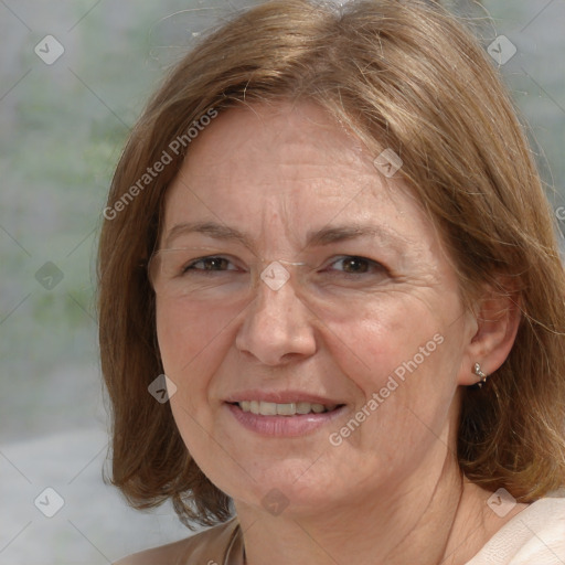 Joyful white adult female with medium  brown hair and blue eyes