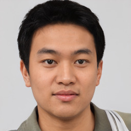 Neutral asian young-adult male with short  black hair and brown eyes