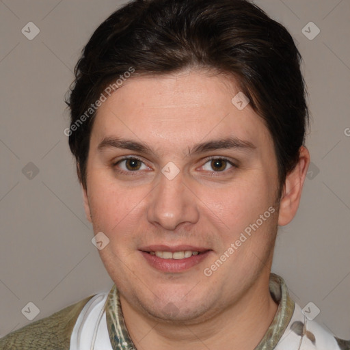 Joyful white young-adult male with short  brown hair and brown eyes