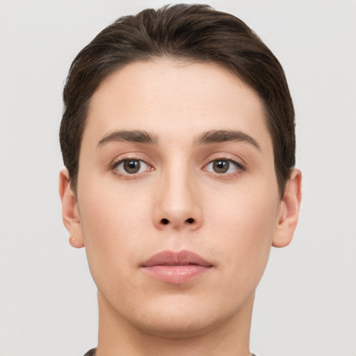 Neutral white young-adult female with short  brown hair and brown eyes