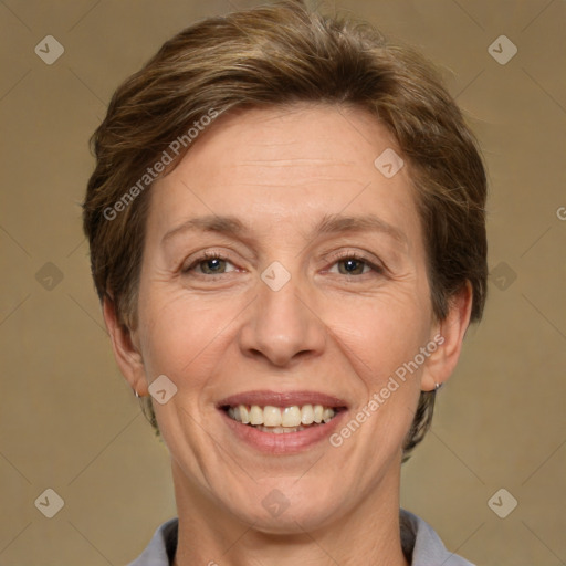 Joyful white adult female with short  brown hair and grey eyes