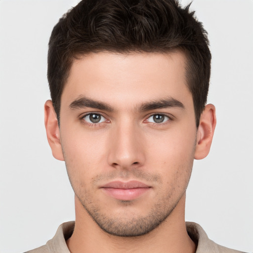 Neutral white young-adult male with short  brown hair and brown eyes