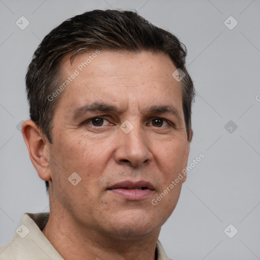 Neutral white adult male with short  brown hair and brown eyes