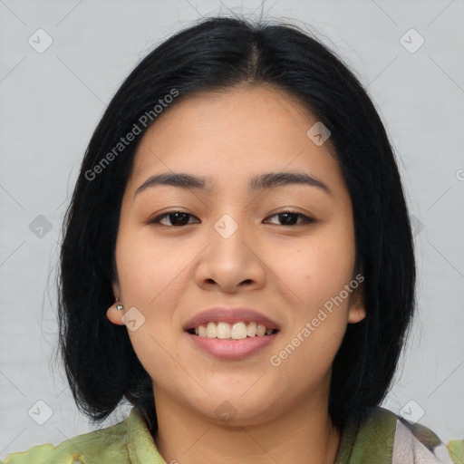 Joyful asian young-adult female with medium  black hair and brown eyes