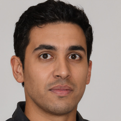 Neutral latino young-adult male with short  brown hair and brown eyes