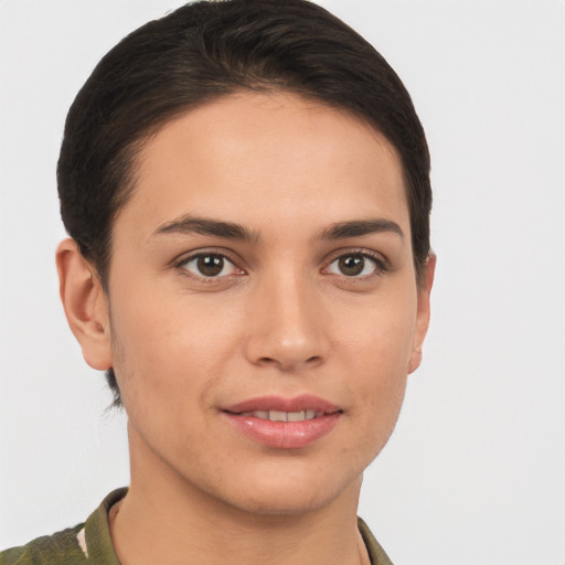 Joyful white young-adult female with short  brown hair and brown eyes