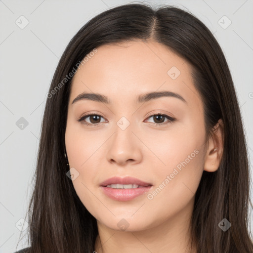 Joyful white young-adult female with long  black hair and brown eyes