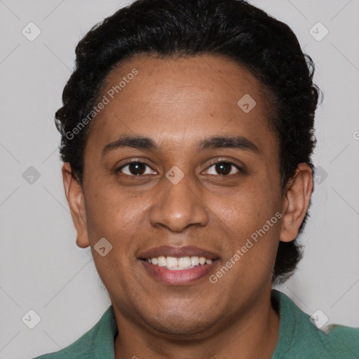 Joyful black young-adult female with short  black hair and brown eyes