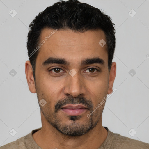 Neutral latino young-adult male with short  black hair and brown eyes