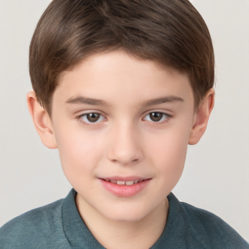 Joyful white child male with short  brown hair and brown eyes