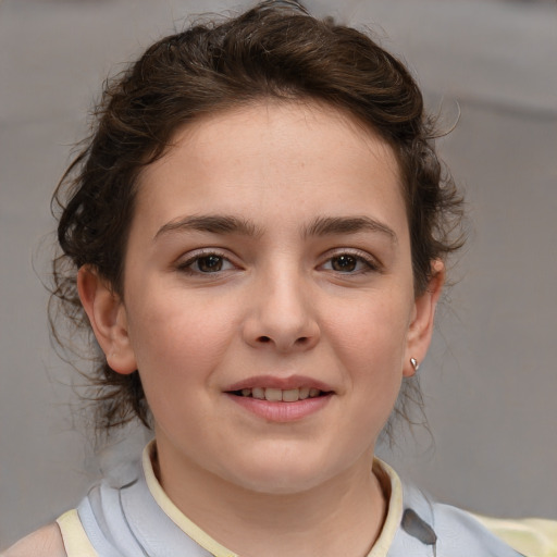 Joyful white child female with medium  brown hair and brown eyes