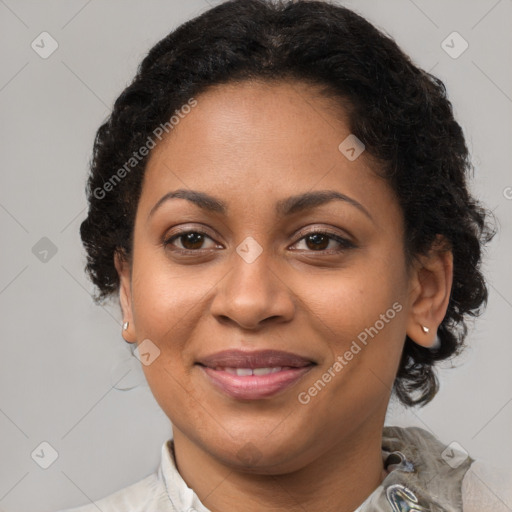 Joyful latino adult female with medium  brown hair and brown eyes