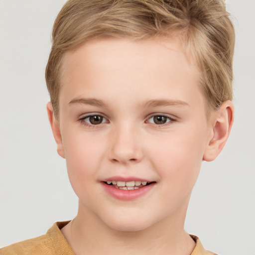 Joyful white child female with short  brown hair and brown eyes