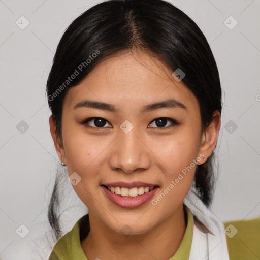 Joyful asian young-adult female with medium  brown hair and brown eyes