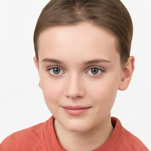 Joyful white child female with short  brown hair and brown eyes