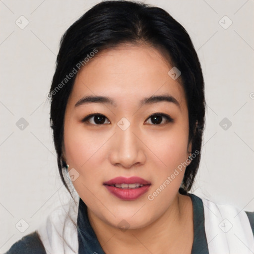 Joyful asian young-adult female with medium  black hair and brown eyes