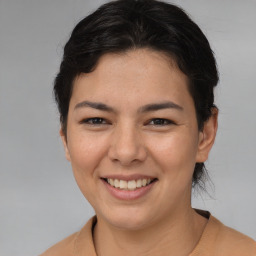 Joyful asian young-adult female with medium  brown hair and brown eyes