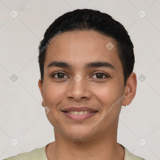 Joyful latino young-adult male with short  black hair and brown eyes