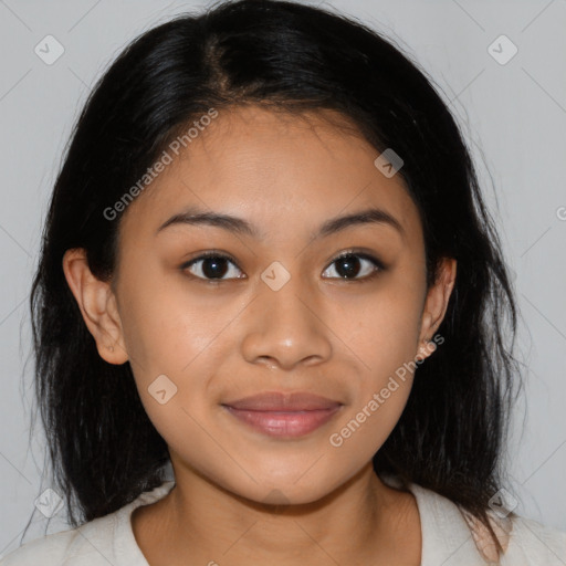 Joyful latino young-adult female with medium  brown hair and brown eyes