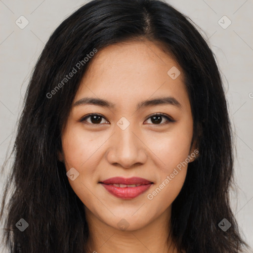 Joyful latino young-adult female with long  brown hair and brown eyes