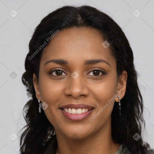 Joyful black young-adult female with long  black hair and brown eyes