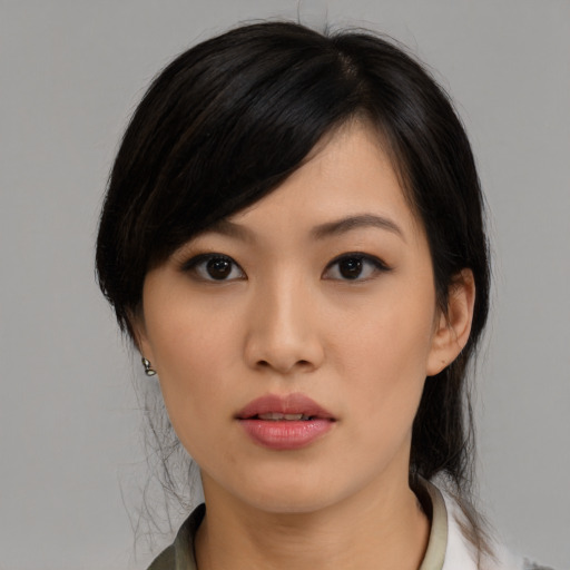 Neutral asian young-adult female with medium  black hair and brown eyes