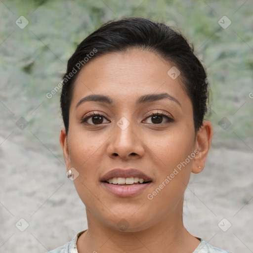 Joyful asian young-adult female with short  brown hair and brown eyes