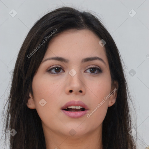 Joyful asian young-adult female with long  brown hair and brown eyes