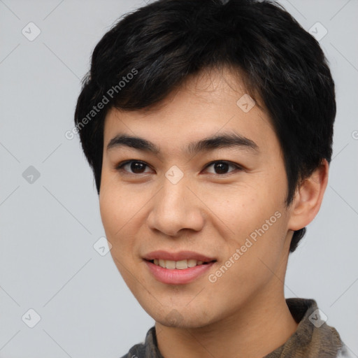 Joyful asian young-adult male with short  black hair and brown eyes