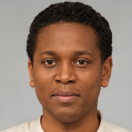 Neutral latino young-adult male with short  brown hair and brown eyes