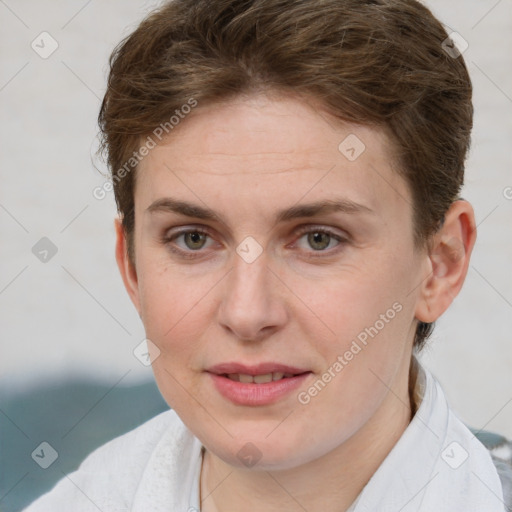 Joyful white young-adult female with short  brown hair and grey eyes