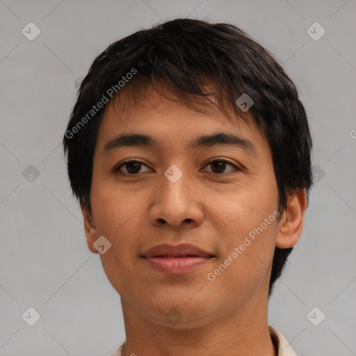 Joyful asian young-adult male with short  brown hair and brown eyes