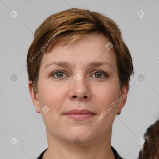 Joyful white young-adult female with short  brown hair and grey eyes