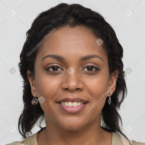 Joyful black young-adult female with long  brown hair and brown eyes