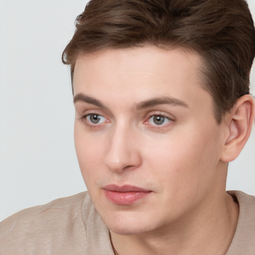 Neutral white young-adult male with short  brown hair and brown eyes