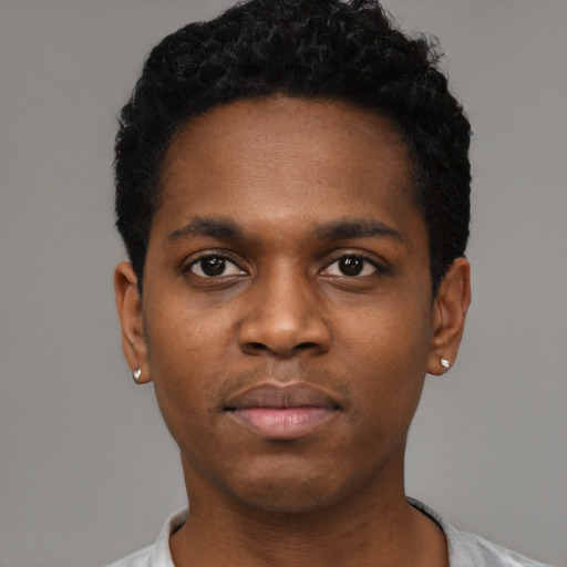 Neutral black young-adult male with short  black hair and brown eyes