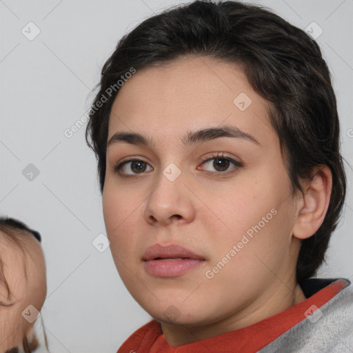 Neutral white young-adult female with medium  brown hair and brown eyes