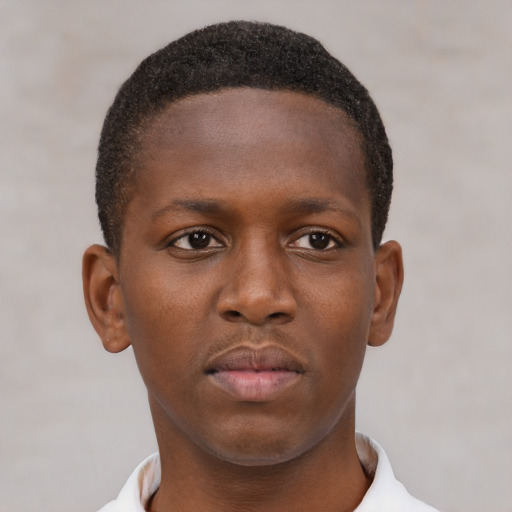 Neutral black young-adult male with short  brown hair and brown eyes