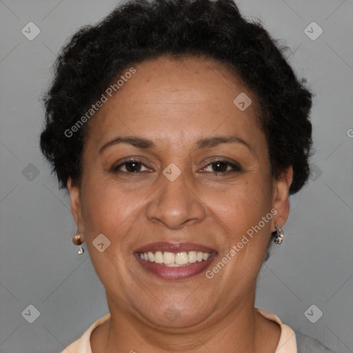 Joyful latino adult female with short  brown hair and brown eyes