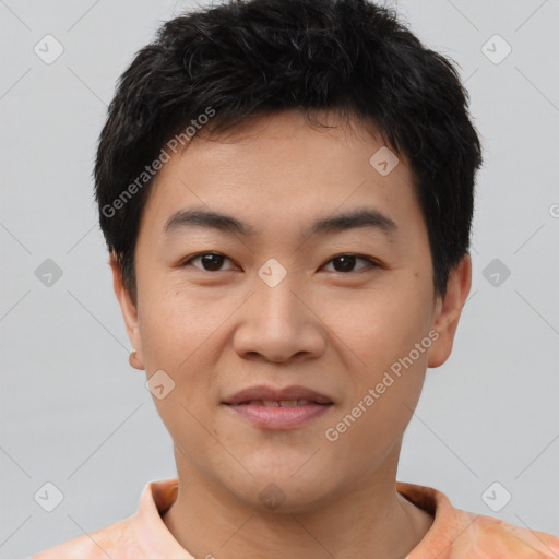 Joyful asian young-adult male with short  black hair and brown eyes