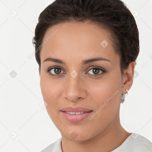 Joyful white young-adult female with short  brown hair and brown eyes