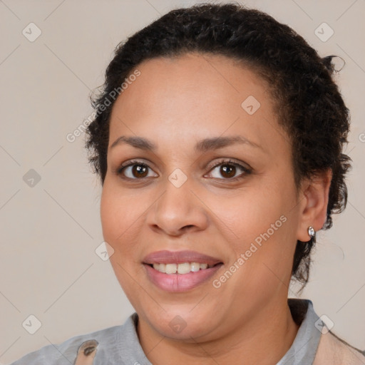 Joyful white adult female with short  brown hair and brown eyes