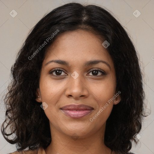 Joyful black young-adult female with medium  brown hair and brown eyes